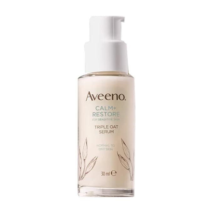Aveeno triple oat serum bottle on a white background