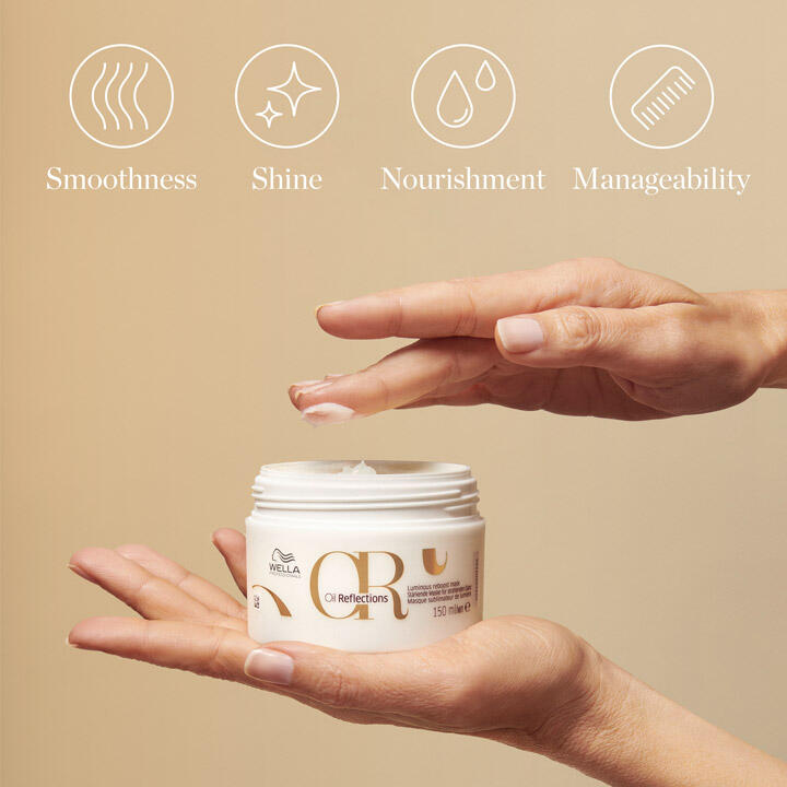 Moisturising hair mask cream texture spread on hand from Wella Reboost Mask